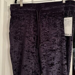 Black Velvet lululemon Joggers with drawstring waist and cuffed legs, size 14